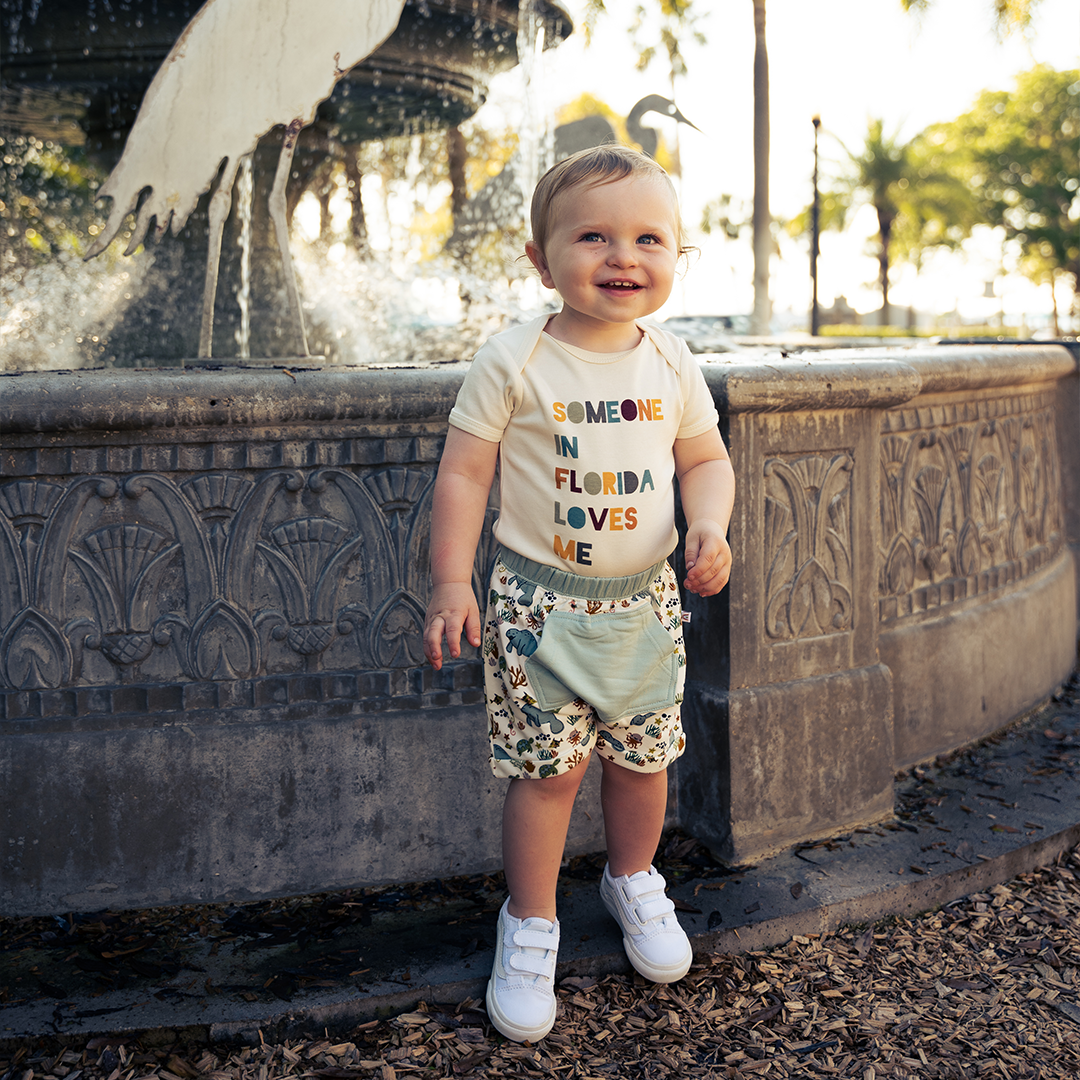 Emerson and Friends - Someone in FL Loves Me Florida Baby Gift Cotton Onesie