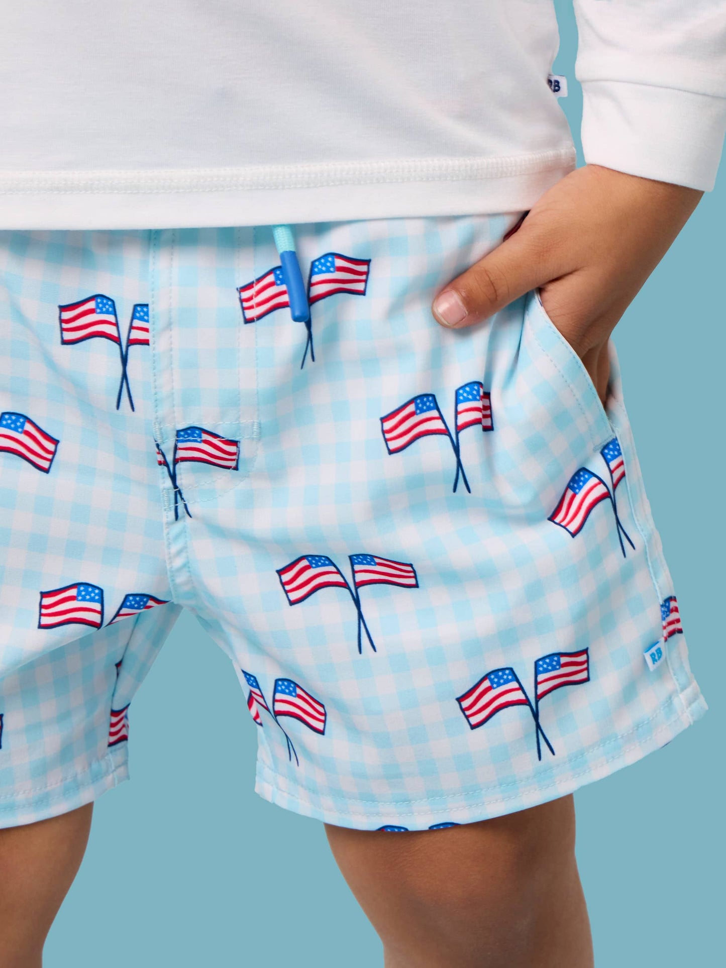 RuffleButts + RuggedButts - Boys Blue Patriotic Gingham Performance Hybrid Swim Trunks