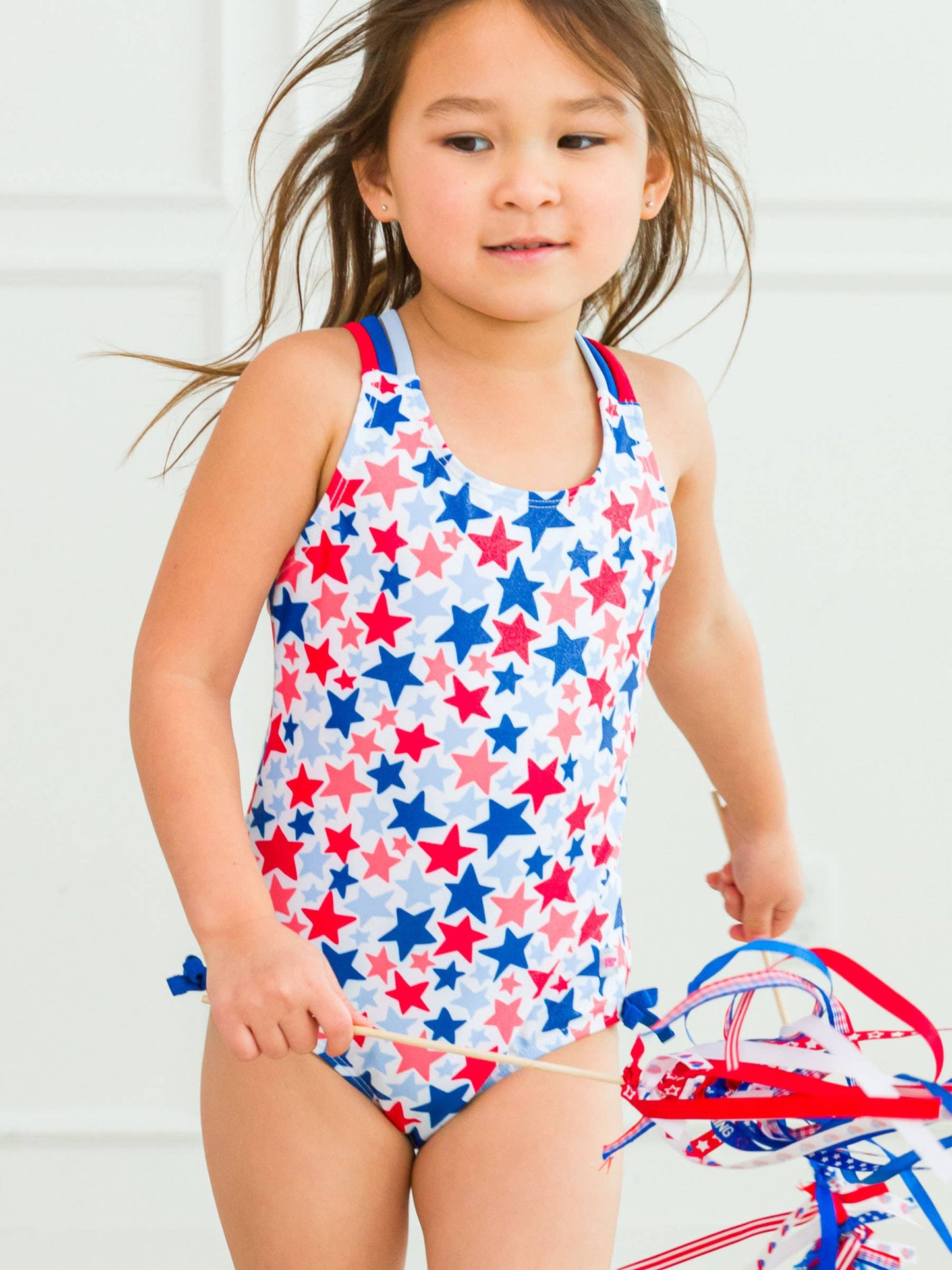 RuffleButts + RuggedButts - Girls Shimmer Star-Spangled Cross-Back One Piece Swimsuit