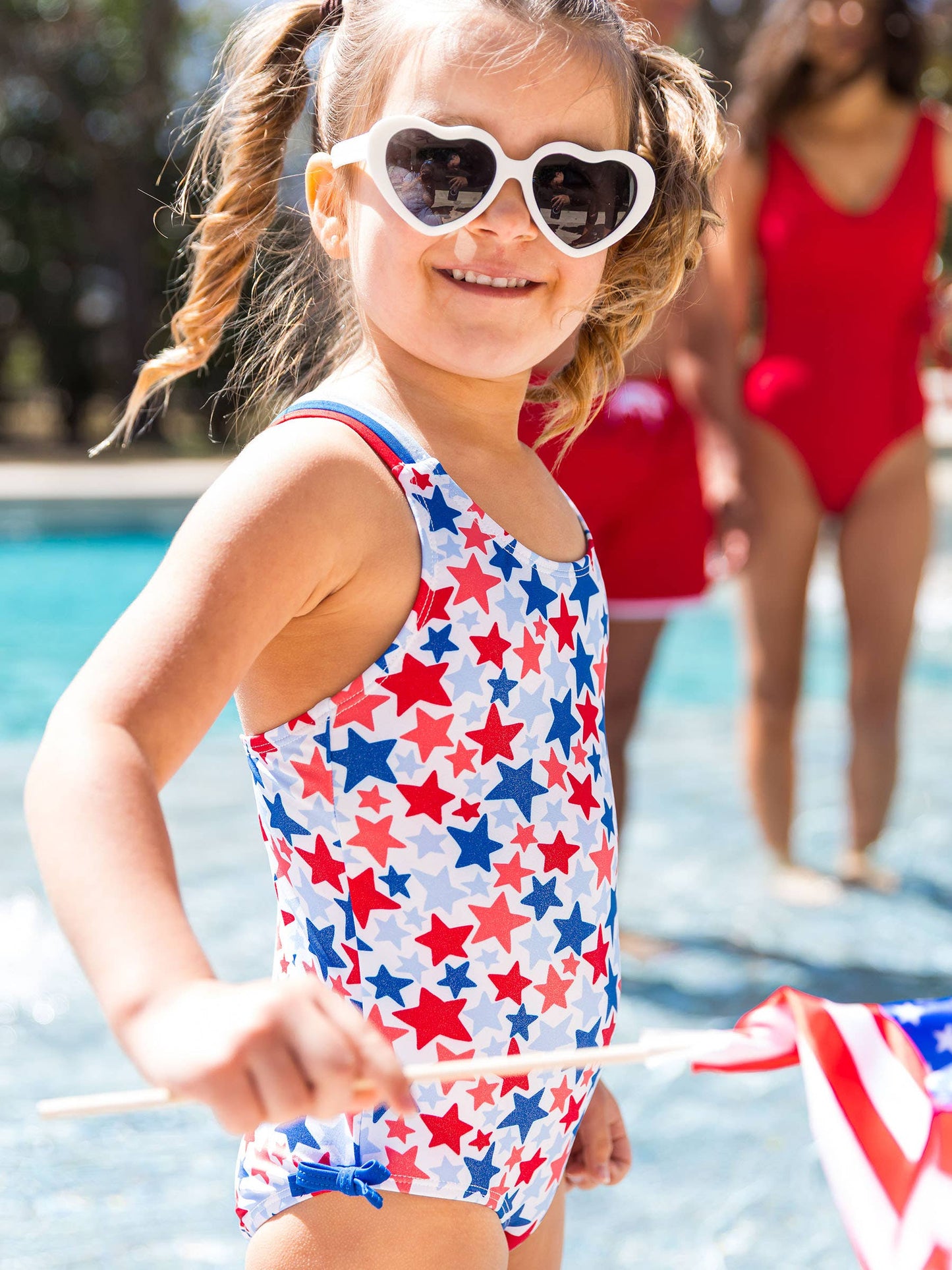 RuffleButts + RuggedButts - Girls Shimmer Star-Spangled Cross-Back One Piece Swimsuit